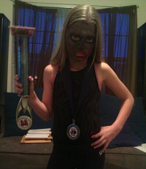 Zombie Gymnast by Maddie. The trophy as blunt force weapon is spectacular. 2013 Halloween Costume Contest winner